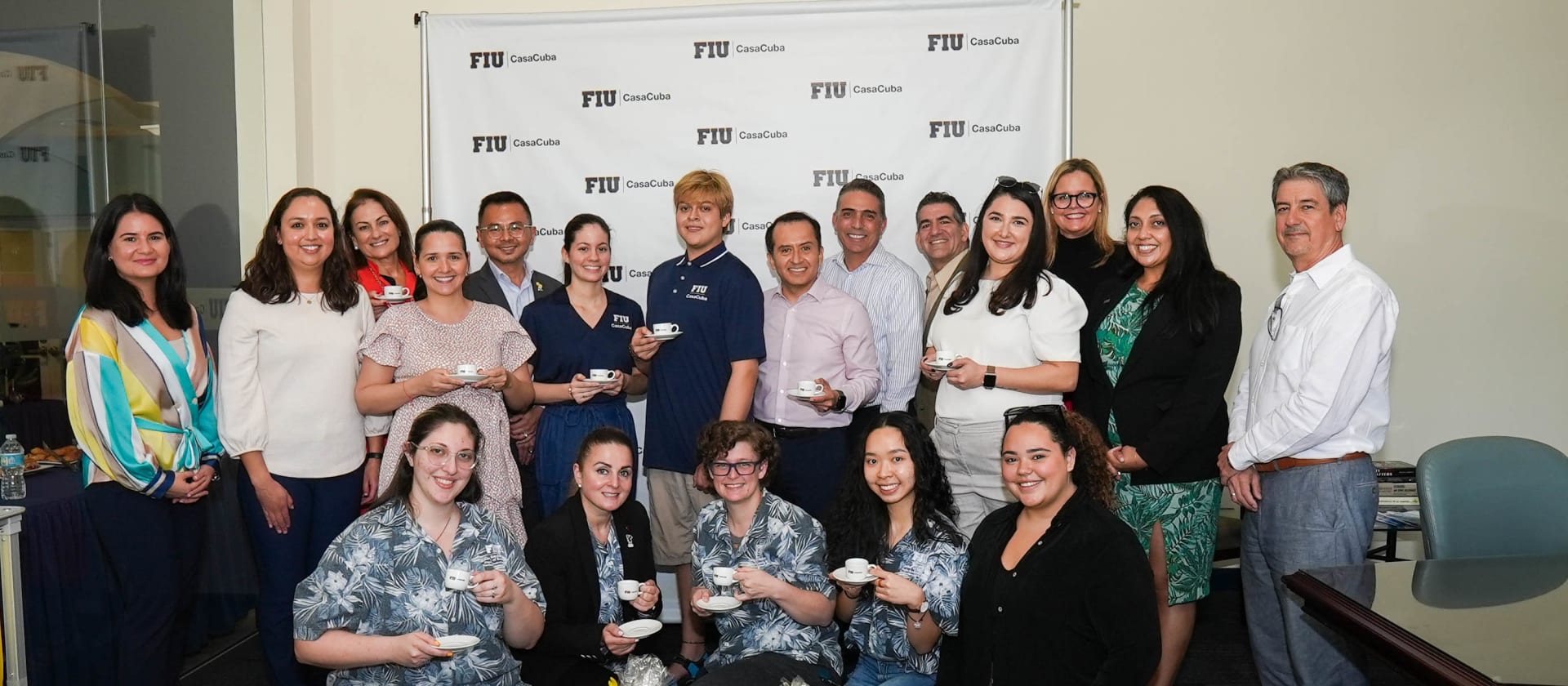 Café Bustelo, FIU CasaCuba, FIU Chaplin School of Hospitality & Tourism Management and FIU Foundation executives and students from the FIU student club The Coffee Guild share a cafecito in celebration of $1.25 million dollar gift.